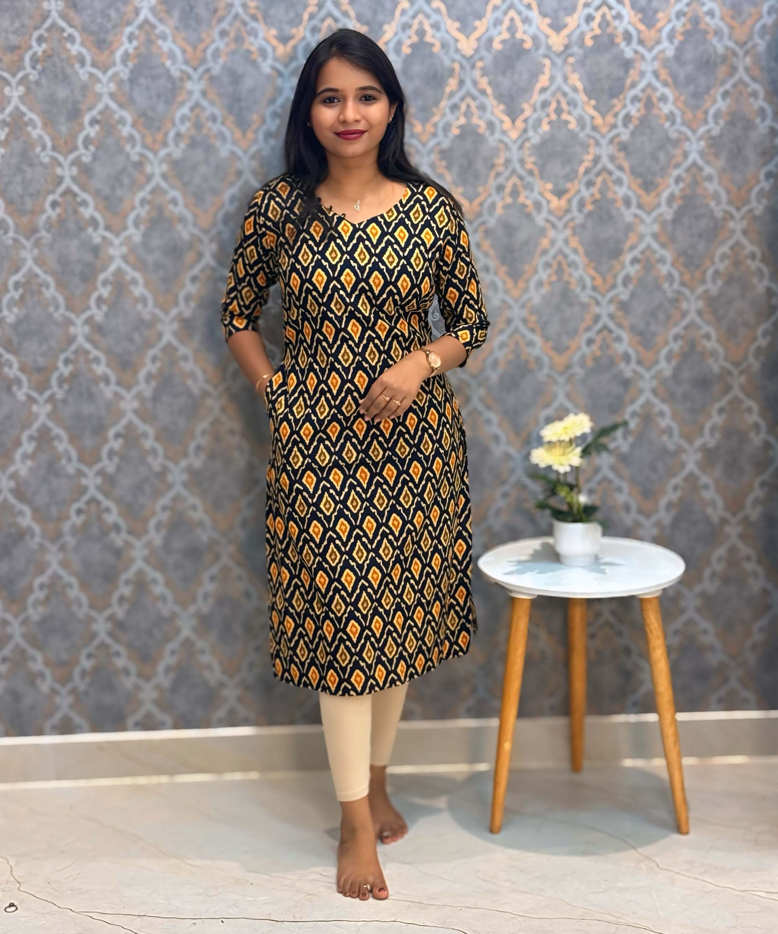 Black and Yellow Color Ikkat Print Flex Cotton Kurti with Pocket / LSS180