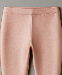 Close-up of pink pants on a gray background