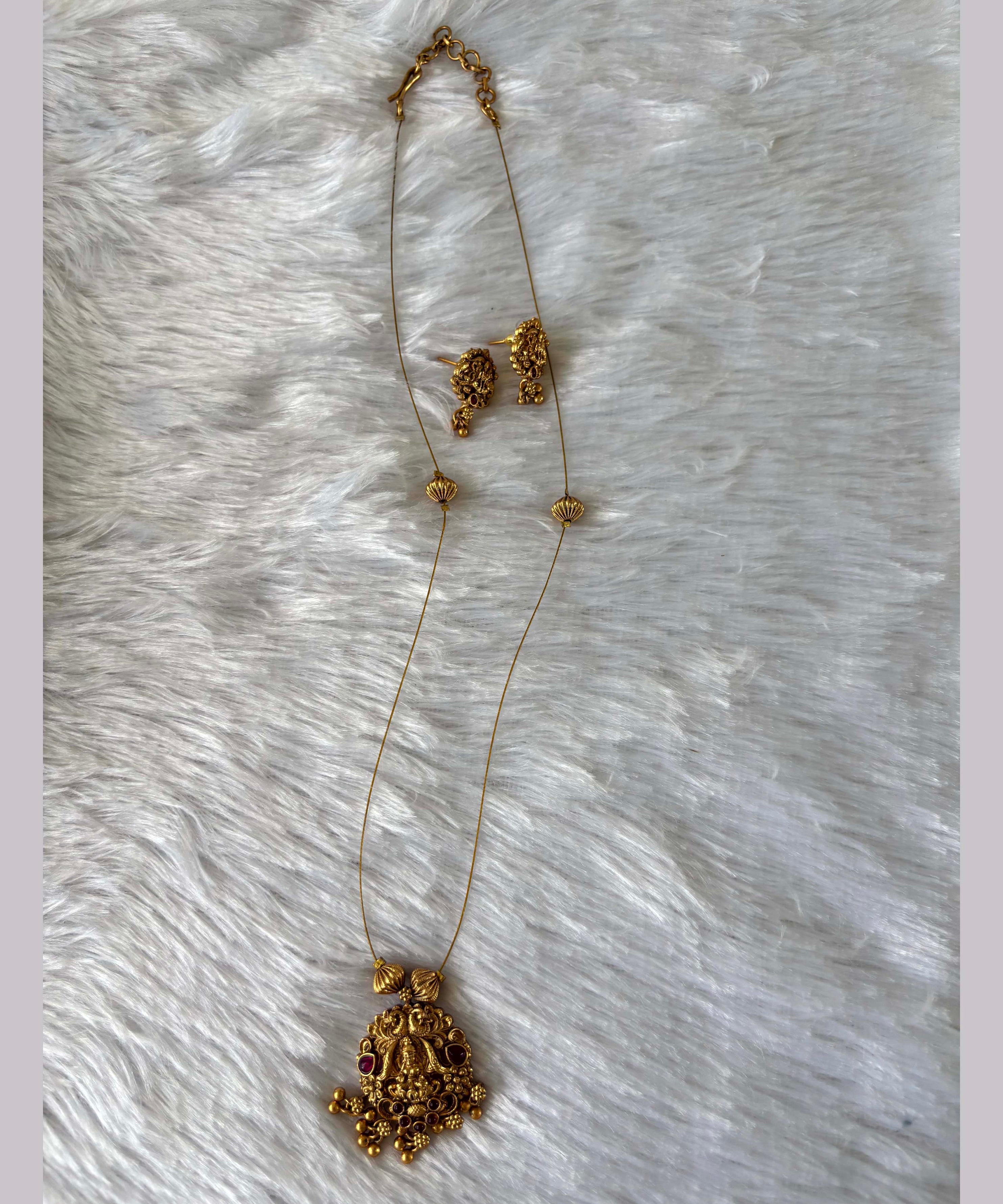 Grand Lakshmi Pendant Invisible Chain Necklace Set – Antique Finish (Imitation Jewellery) - JIN011