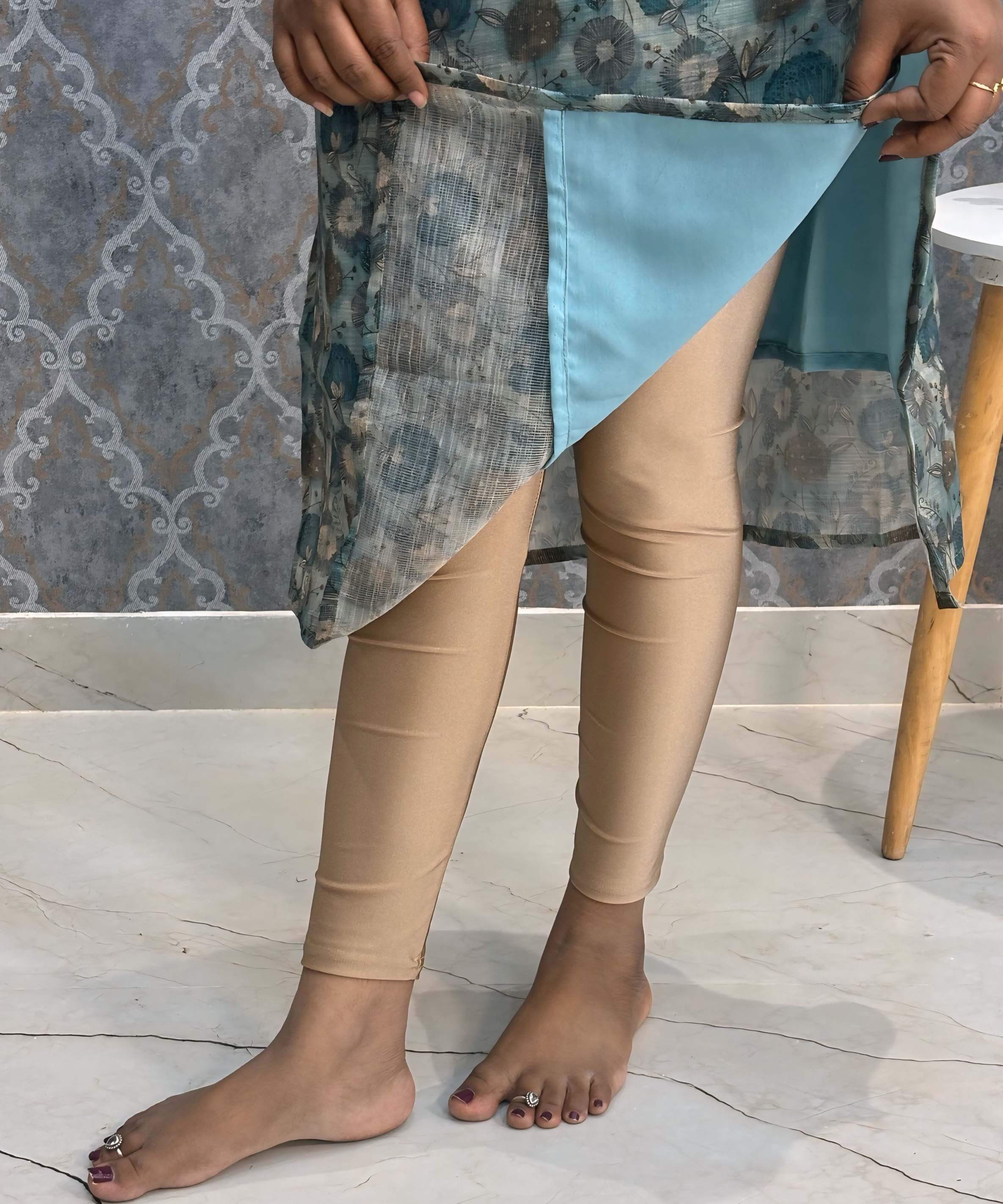 Lite Blue Color Floral Design Potli Neck Pattern Premium Tissue Kurti with Lining / LSS184