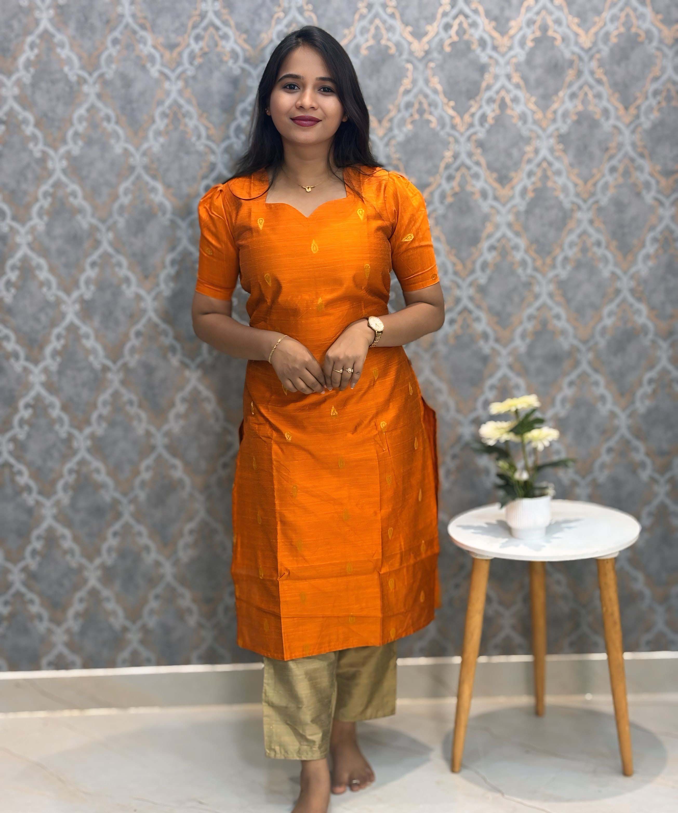 Orange Color Sweetheart Neck Premium Dupion Raw Silk Kurti with Thilagam Shape Zari Butta & Lining Coord Set / LSS187
